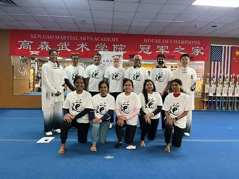Kids & Adults tai chi students relaxing and socializing after training in Dublin gym